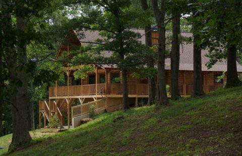 Our beautifully crafted log home nestles tranquilly on a picturesque hillside.