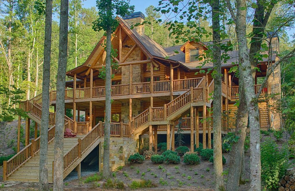 Our product features a serene, rustic log cabin nestled amidst lush woods, complete with inviting stairs leading up to its welcoming porch.