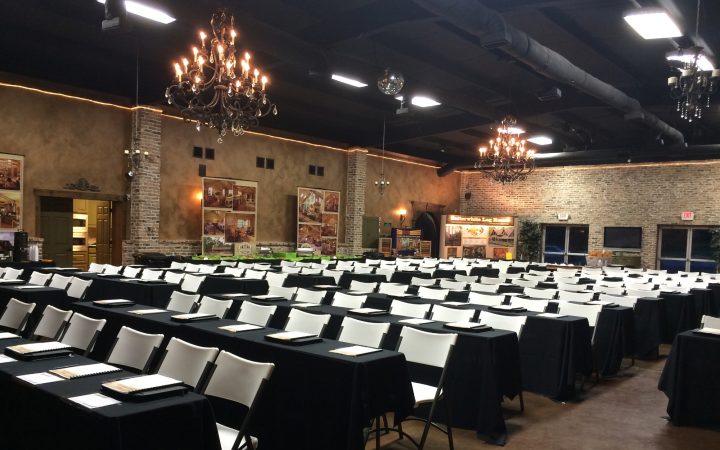 Seating is shown in the conference area at the Satterwhite Log Homes Seminar.